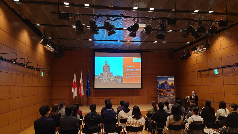 Director Maria Orzeł giving a presentation